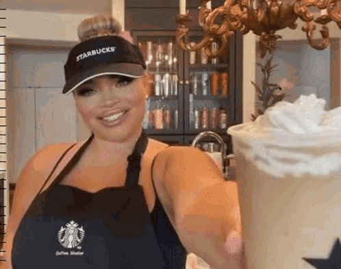 Woman in Starbucks Hat Holding Drink