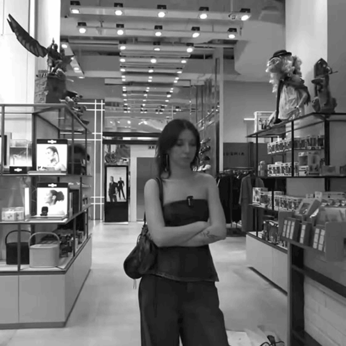 Woman in Store With Sign Saying Sofia