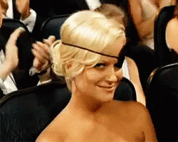 Woman In Strapless Dress And Black Eye Patch GIF