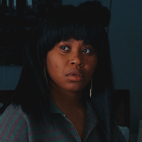Woman In Striped Shirt And Earrings GIF