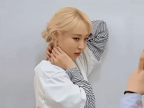 Woman In Striped Shirt Being Held GIF
