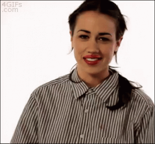 Woman in Striped Shirt Making Funny Face