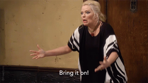 Woman In Striped Shirt Saying Bring It On GIF