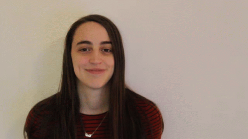 Woman in Striped Shirt Smiling