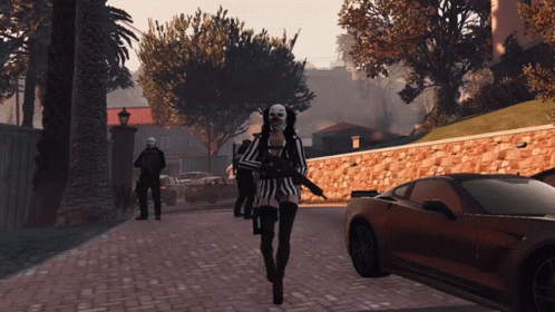 Woman in Striped Shirt Walking Down Street