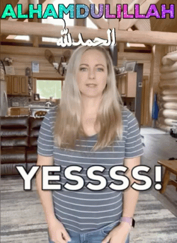 Woman in Striped Shirt With Yesss Sign