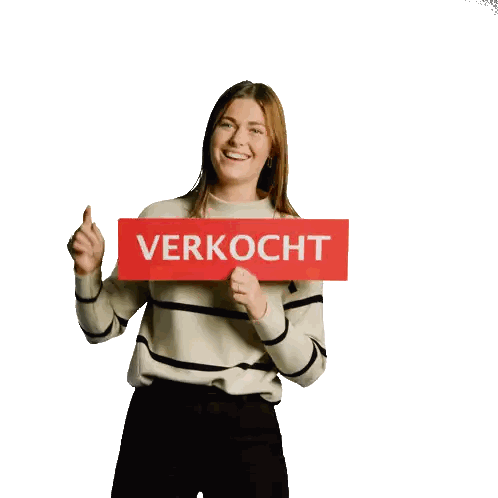 Woman in Striped Sweater Holding Verkocht Sign