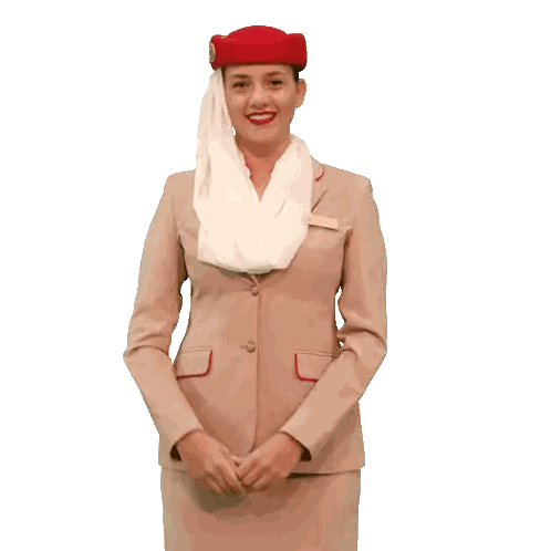 Woman in Suit and Red Hat Making Heart