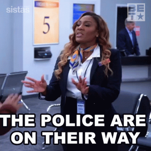 Woman in Suit and Scarf Talking at Airport