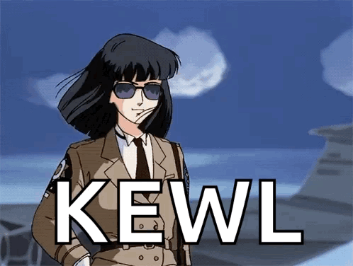 Woman in Suit and Tie Kewl