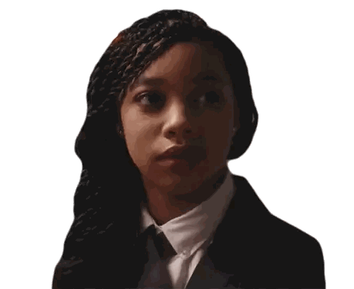 Woman in Suit and Tie Looking Down