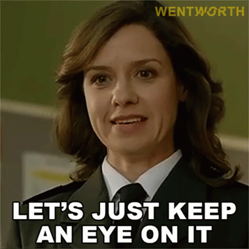 Woman in Suit and Tie Says Let's Just Keep an Eye on It