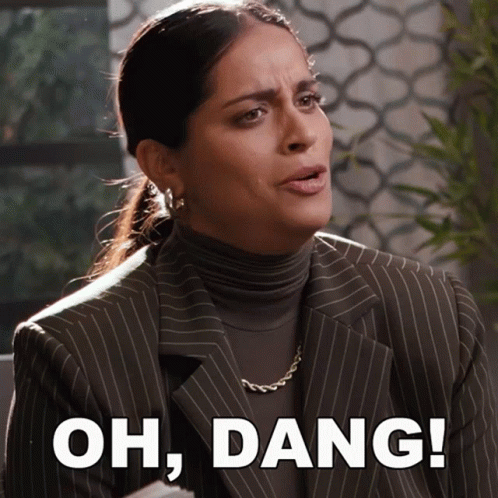 Woman in Suit and Turtleneck Saying Oh Dang