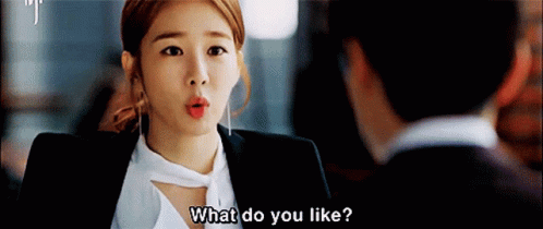 Woman in Suit Asking Man What Do You Like