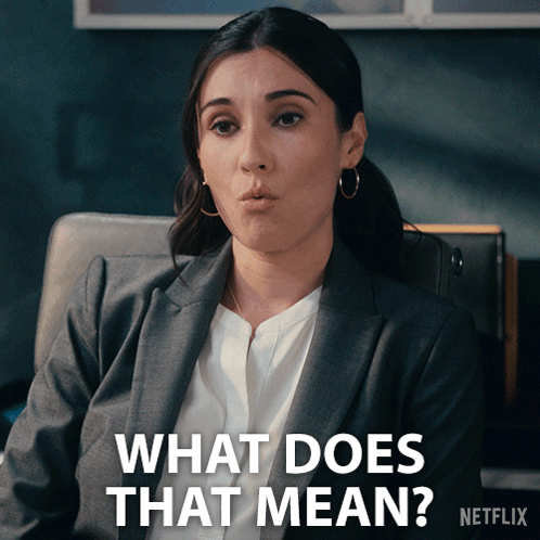 Woman In Suit Asking What Does That Mean On Netflix GIF