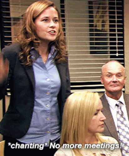 Woman in Suit Chanting No More Meetings
