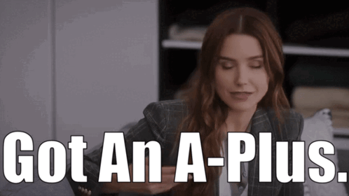 Woman In Suit Saying Got An A+ GIF