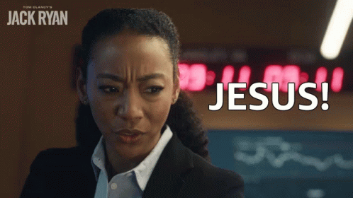 Woman In Suit Saying Jesus GIF