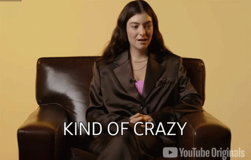 Woman In Suit Saying Kind Of Crazy GIF