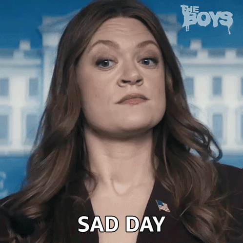 Woman in Suit Saying Sad Day at White House