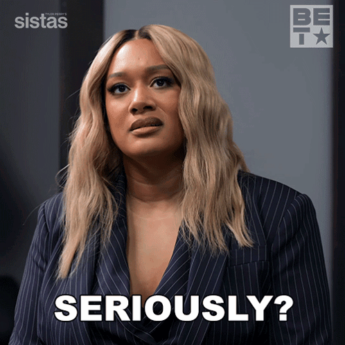 Woman in Suit Says Seriously