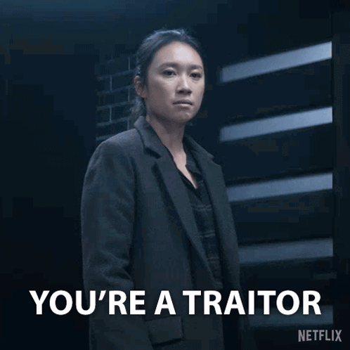 Woman in Suit Says You're a Traitor