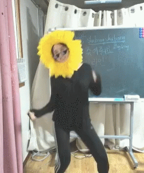Woman in Sunflower Hat Dancing Shabana Shibang