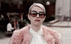 Woman in Sunglasses and Fur Coat