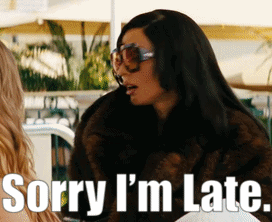 Woman In Sunglasses And Fur Coat Says Sorry I'm Late GIF