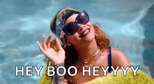 Woman in Sunglasses and Headband Saying Hey Boo