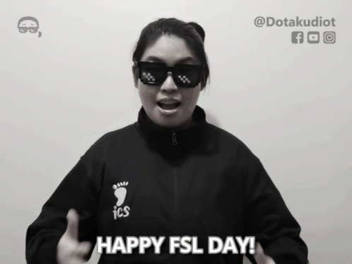 Woman in Sunglasses and ICS Jacket Says Happy FSL Day