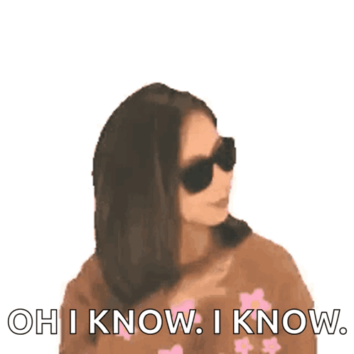 Woman in Sunglasses and Pink Flower Sweater Saying Oh I Know
