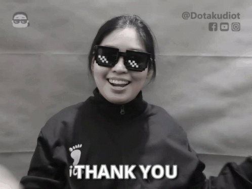 Woman in Sunglasses and Thank You Sweatshirt