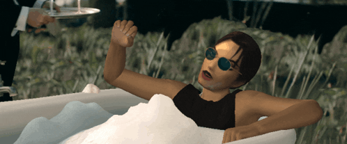 Woman in Sunglasses Laying in Bathtub With Foam