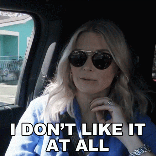 Woman in Sunglasses Saying I Don't Like It
