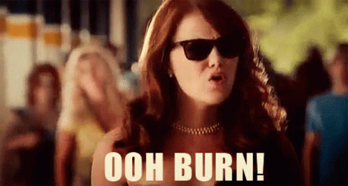 Woman In Sunglasses Saying Ooh Burn GIF