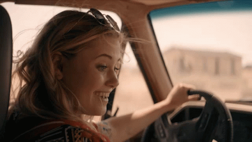 Woman In Sunglasses Smiling Driving GIF