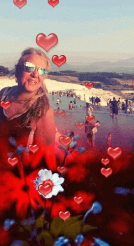 Woman In Sunglasses Surrounded By Hearts And Flowers GIF