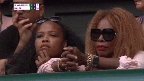 Woman in Sunglasses Watching Serena Williams vs Halep