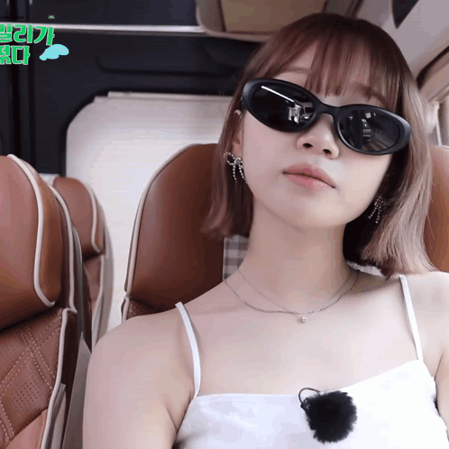 Woman in Sunglasses White Tank Top