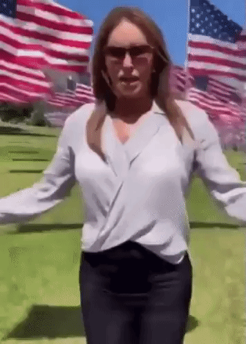 Woman in Sunglasses with American Flags