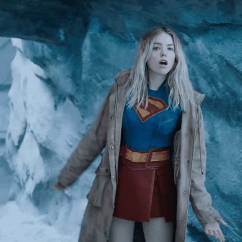 Woman In Superman Costume At Cave GIF