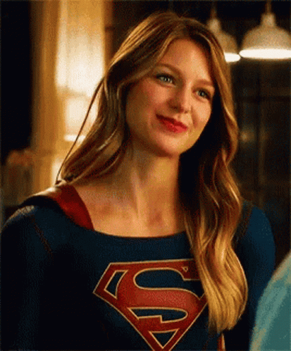Woman In Superman Costume Smiling GIF