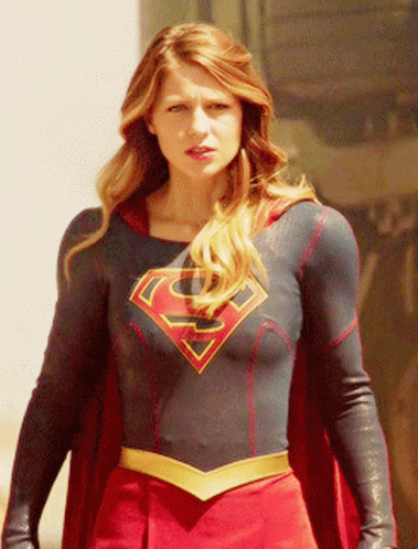 Woman in Superman Costume With S