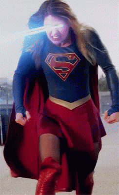 Woman in Superman Costume With S