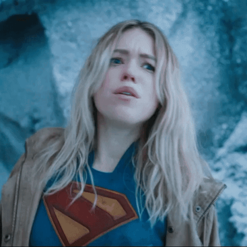 Woman In Superman T-Shirt Looking Up GIF