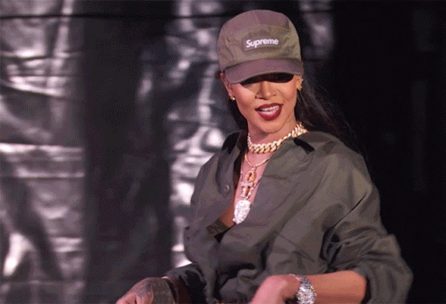 Woman In Supreme Hat And Green Jacket GIF