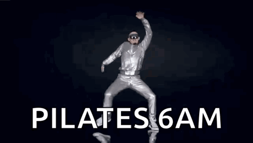 Woman in Swan Costume Dancing Pilates 6am