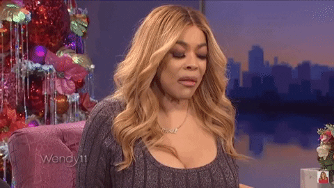 Woman In Sweater And Necklace Saying Wendy GIF