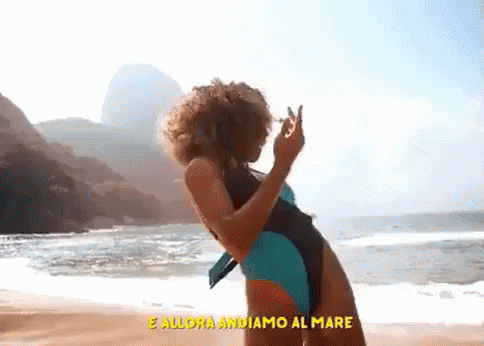 Woman in Swimsuit Standing on Beach